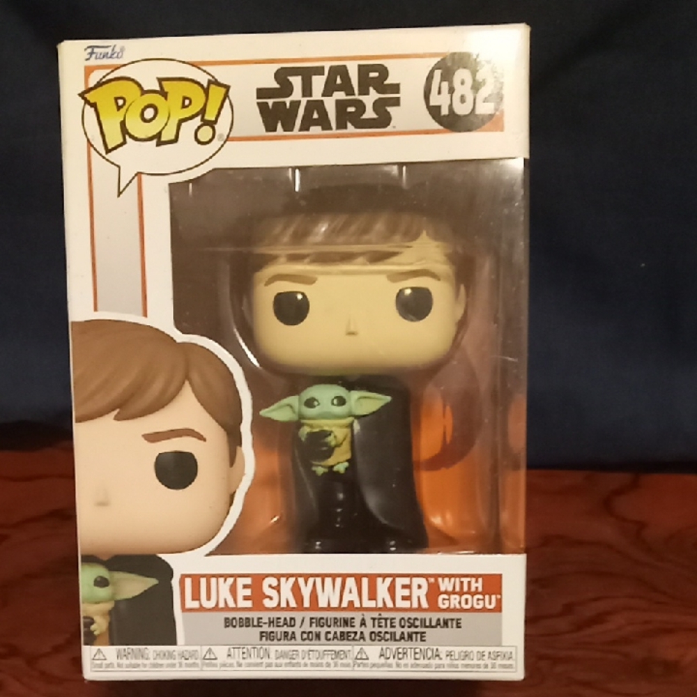 Funko Pop! Luke Skywalker with Grogu Figure